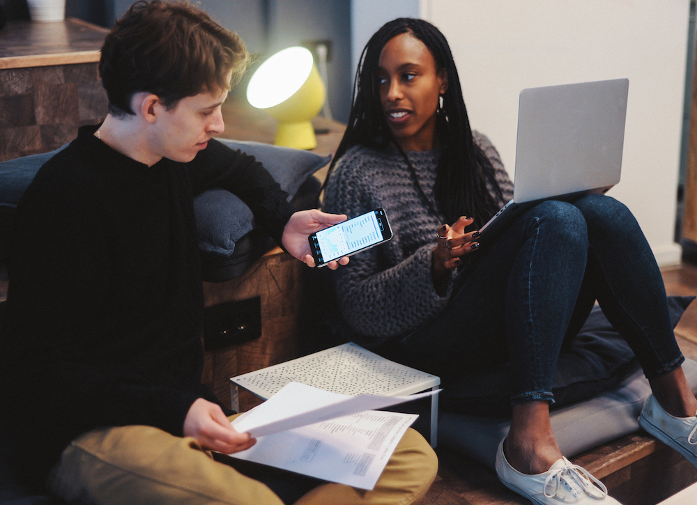 Young couple planning their finances, savings and investments