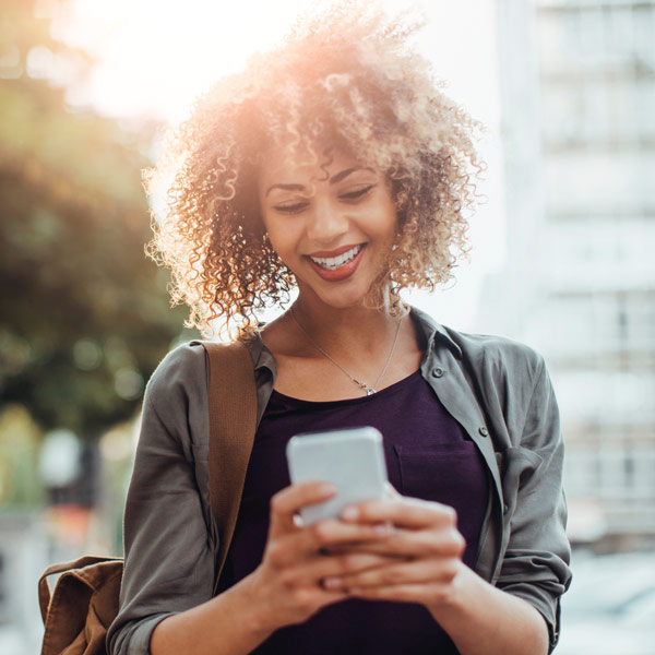 Woman using mobile device